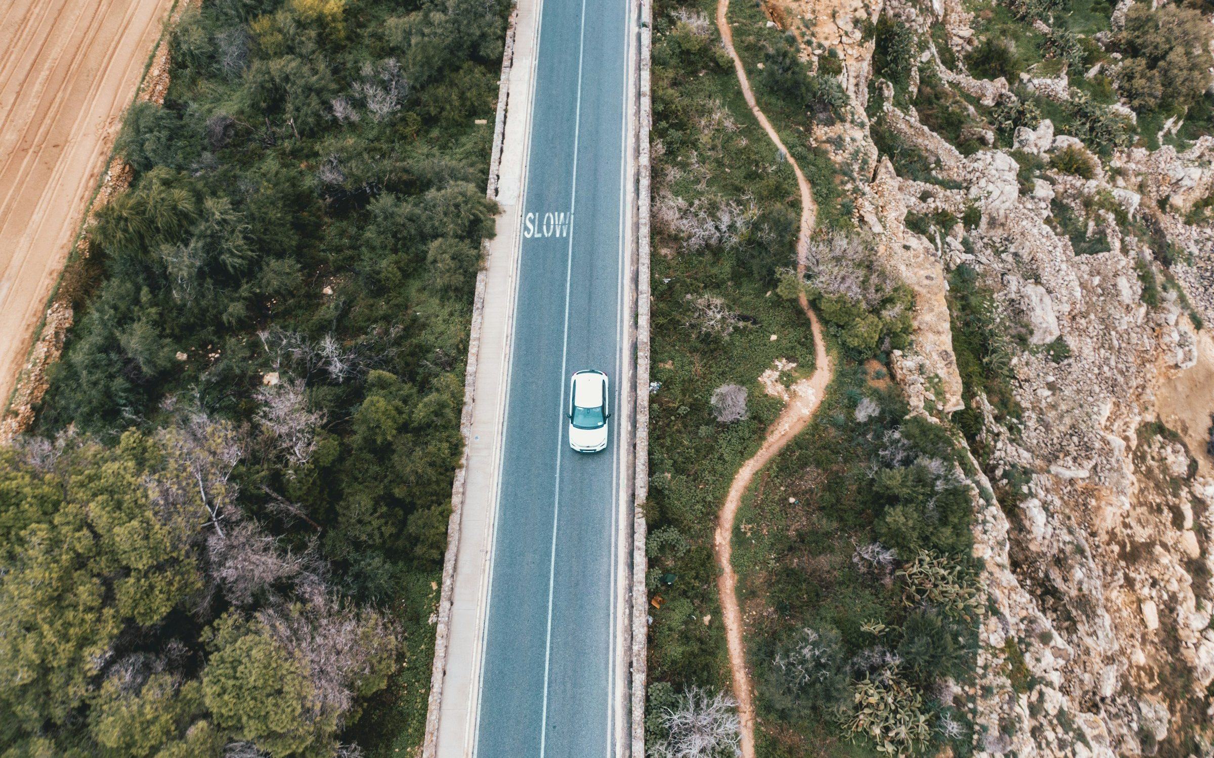 A hire car on a coastal road in Malta